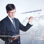 businessman drawing digital business screen